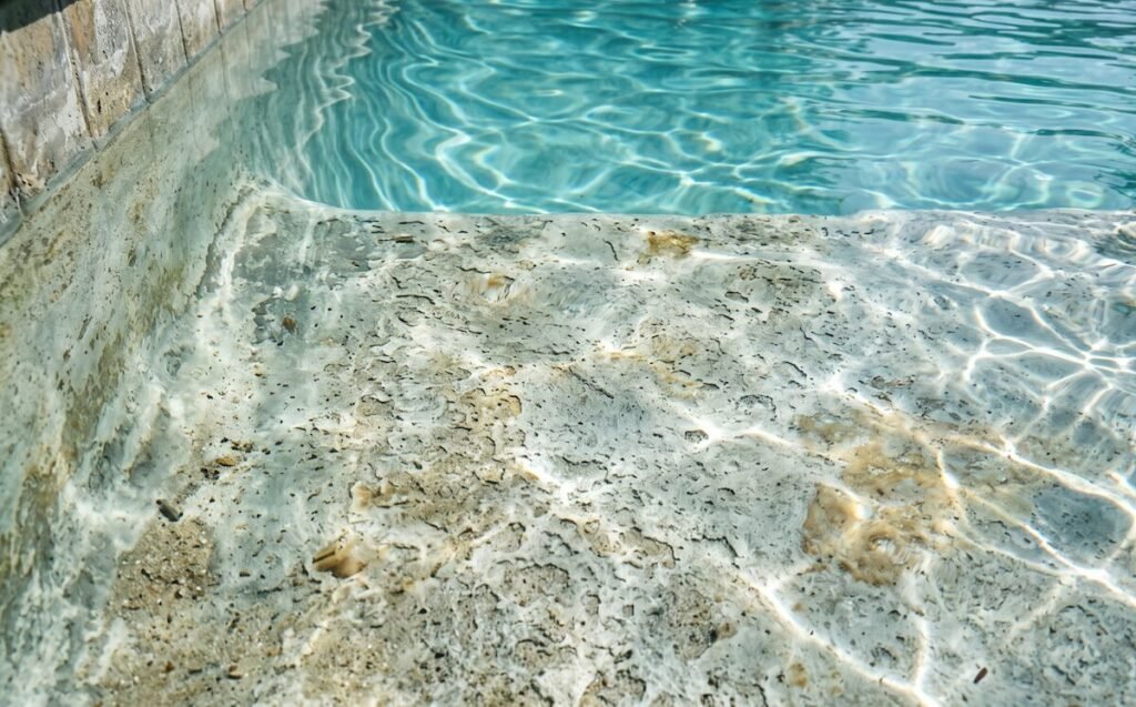 an aging pool interior surface